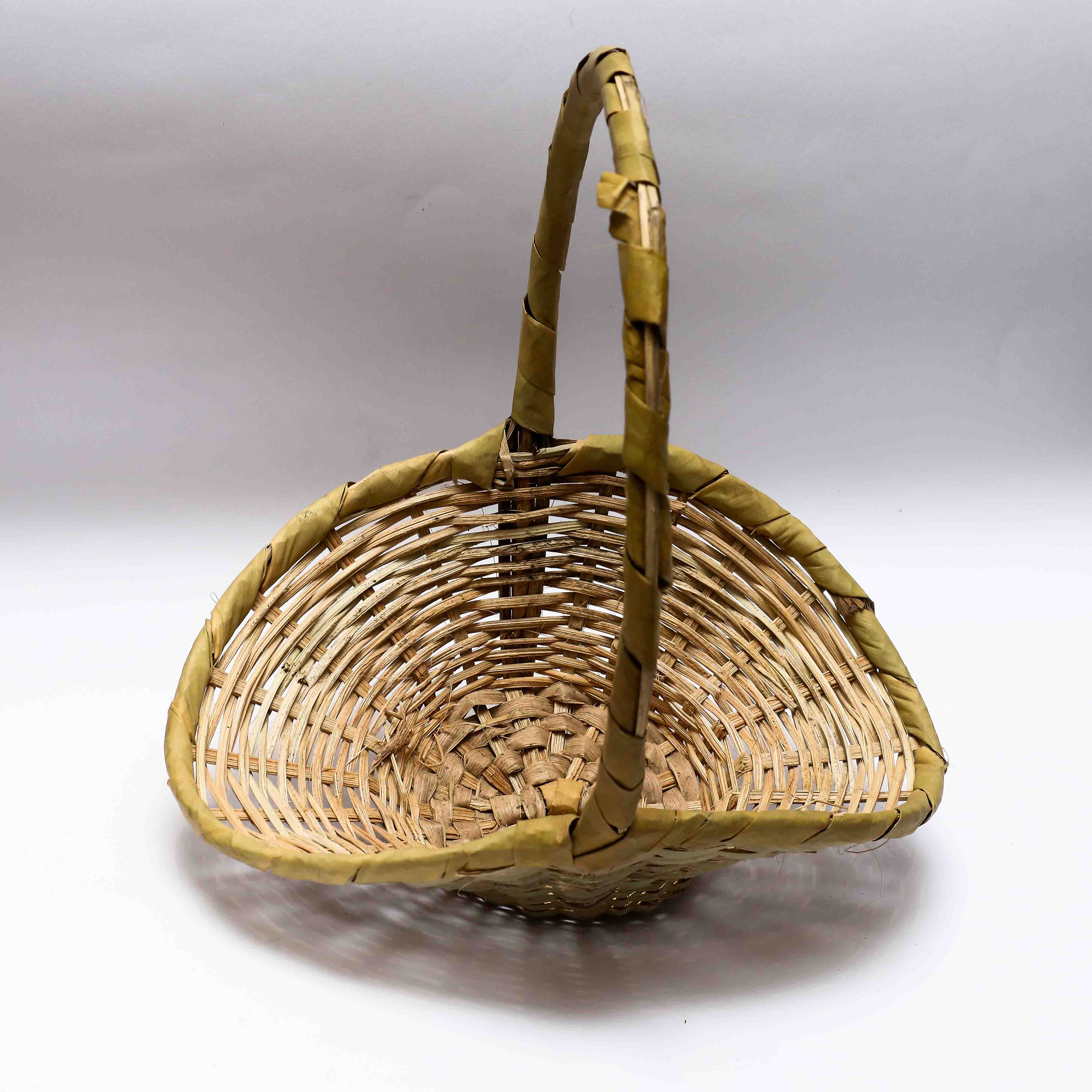 Decorative basket for storage and display around the home.