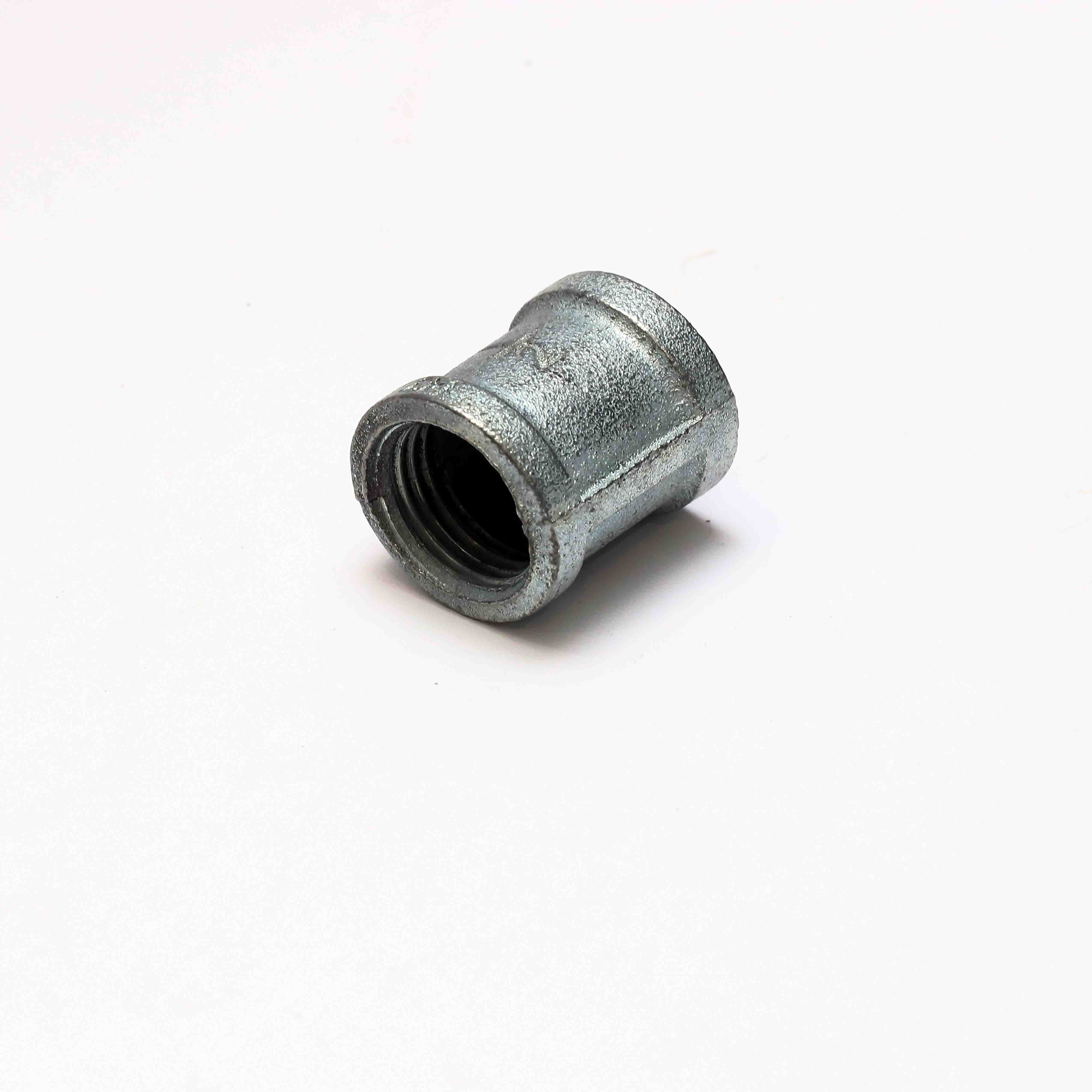 Galvanised iron connector for joining 1.5 inch water pipes.