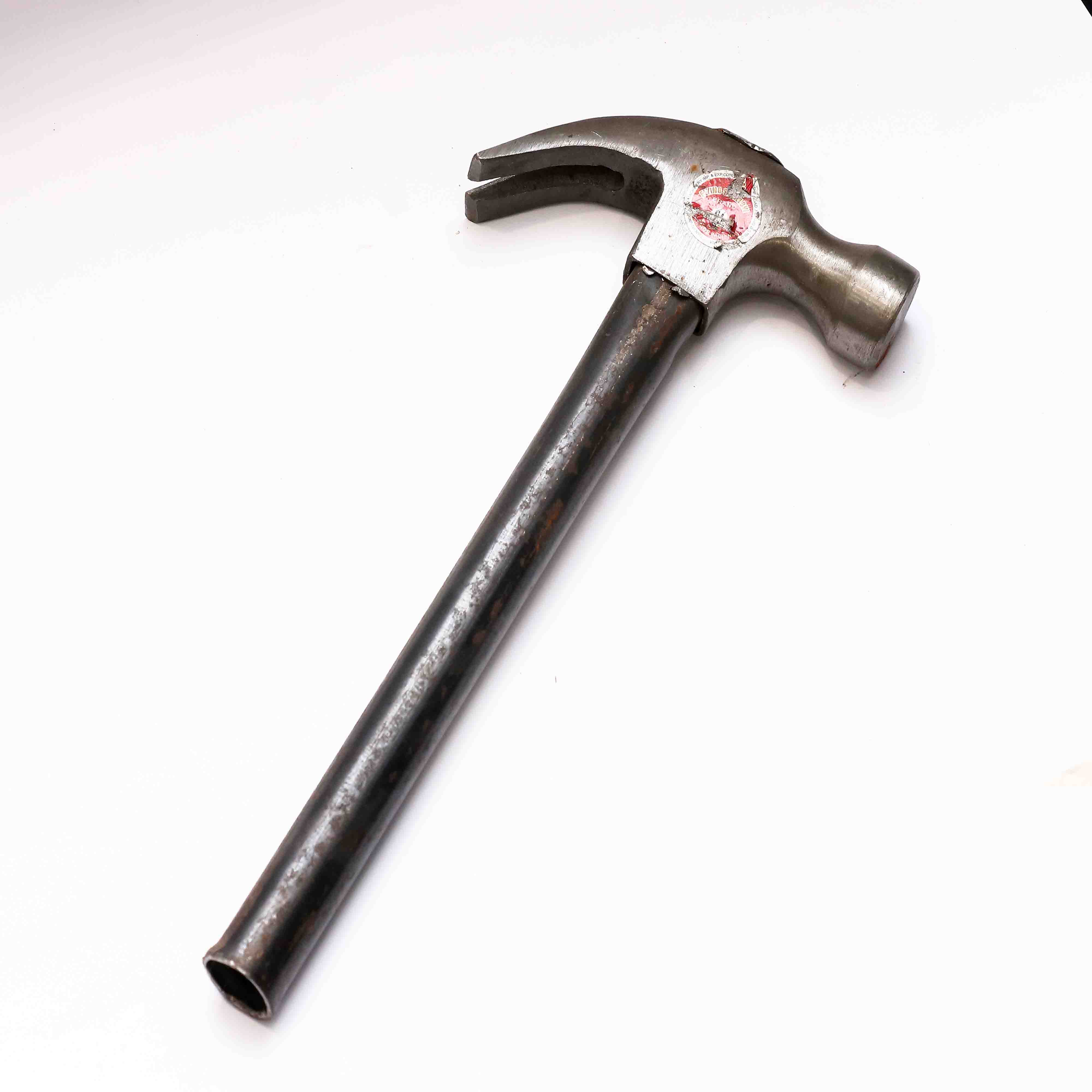 Claw hammer for driving in and pulling out nails.